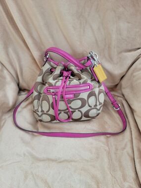 Coach Signature Drawstring Bucket Bag in Beige and Pink